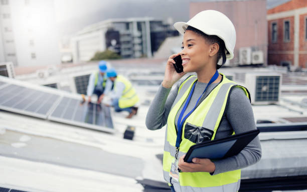 istockphoto-1455979225-612×612 Solar energy, solar panels and electrician on a phone call networking, talking or speaking to a technician. Engineering, roof and happy woman in conversation or communication about renewable energy